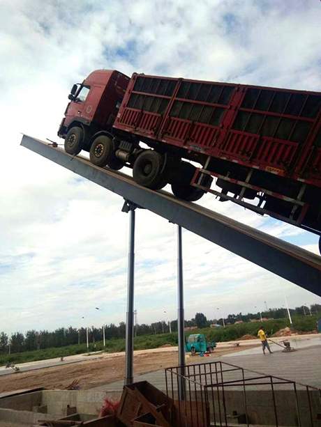 后翻卸車機(jī)